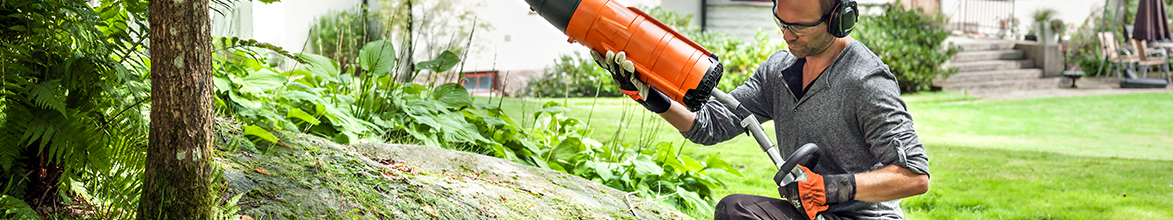 Man attaching blower to Husqvarna Multi Tool